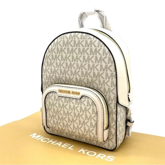Michael Kors Jaycee Extra Small Convertible Zip Packet Backpack Cream/White - Picture 3 of 10